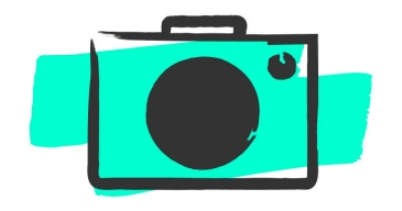 Kamera-Icon: Stilisierte Kamera in türkis und schwarz mit Objektiv, Auslöser und Handgriff, dargestellt als klassische Fotoapparat-Silhouette.