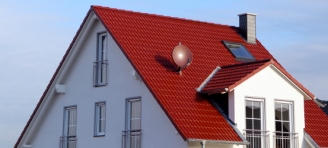 Wer beauftragt den Notar beim Hausverkauf?