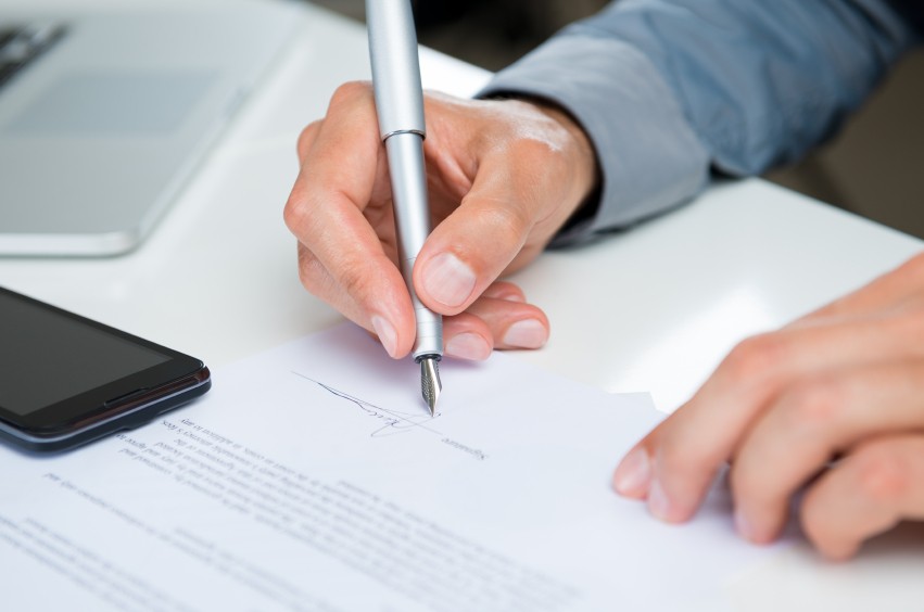 Businessman Signing Contract Businessman Signing Contract